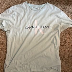 Teal Calvin Klein shirt. Size:Large